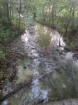Еще один ручей превратили в канализацию в Дзержинске 